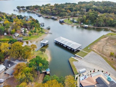 Discover unparalleled lakeside luxury at 5230 Esquire Estates Rd on Pinnacle Golf and Boat Club in Texas - for sale on GolfHomes.com, golf home, golf lot