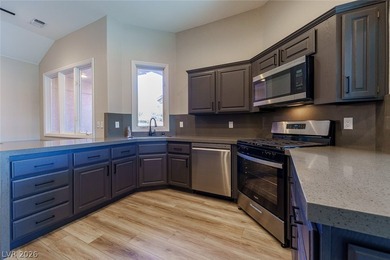 UPDATED GARDENS WEST ON ELEVATED LOT OVERLOOKING GOLF COURSE on Spanish Trail Golf and Country Club in Nevada - for sale on GolfHomes.com, golf home, golf lot