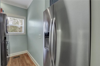 EXPERIENCE THE ULTIMATE LOW COUNTRY LIVING IN A COASTAL FISHING on Sapelo Hammock Golf Club in Georgia - for sale on GolfHomes.com, golf home, golf lot