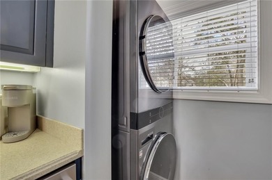 EXPERIENCE THE ULTIMATE LOW COUNTRY LIVING IN A COASTAL FISHING on Sapelo Hammock Golf Club in Georgia - for sale on GolfHomes.com, golf home, golf lot