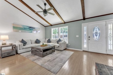 Welcome to 303 Manitowoc Drive, tucked within the highly on The Trail At Chickasaw Pointe in South Carolina - for sale on GolfHomes.com, golf home, golf lot