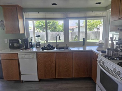 This Gorgeous home located in quiet Sunrise Golf Village. The on Sunrise Lakes Phase IV Golf Course in Florida - for sale on GolfHomes.com, golf home, golf lot