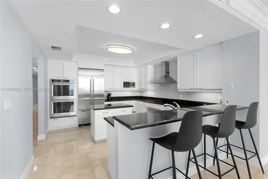 Step into this beautiful unit through a private foyer and be on Turnberry Isle Resort and Club in Florida - for sale on GolfHomes.com, golf home, golf lot