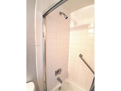 CHARMING 2 bed/ 2 bath, 3RD FLOOR LAKE FRONT CONDO located in on Sunrise Lakes Phase IV Golf Course in Florida - for sale on GolfHomes.com, golf home, golf lot