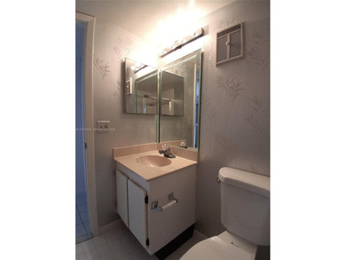 CHARMING 2 bed/ 2 bath, 3RD FLOOR LAKE FRONT CONDO located in on Sunrise Lakes Phase IV Golf Course in Florida - for sale on GolfHomes.com, golf home, golf lot