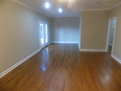 BEAUTIFUL LOT BACKS UP TO ROBERT TRENT JONES GOLF COURSE AND A on Highland Oaks Golf Course in Alabama - for sale on GolfHomes.com, golf home, golf lot