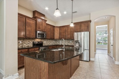 This 3736 square foot home in Eagle Harbor has 5 bedrooms & 4 on Eagle Harbor Golf Club in Florida - for sale on GolfHomes.com, golf home, golf lot