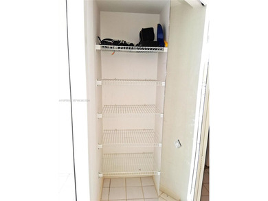 CHARMING 2 bed/ 2 bath, 3RD FLOOR LAKE FRONT CONDO located in on Sunrise Lakes Phase IV Golf Course in Florida - for sale on GolfHomes.com, golf home, golf lot