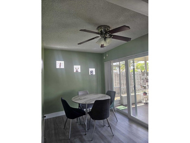 This Gorgeous home located in quiet Sunrise Golf Village. The on Sunrise Lakes Phase IV Golf Course in Florida - for sale on GolfHomes.com, golf home, golf lot