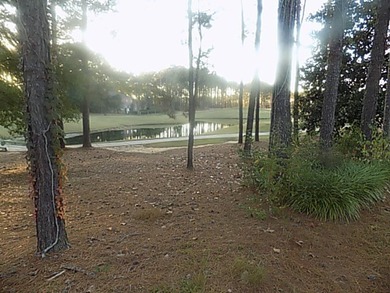 BEAUTIFUL LOT BACKS UP TO ROBERT TRENT JONES GOLF COURSE AND A on Highland Oaks Golf Course in Alabama - for sale on GolfHomes.com, golf home, golf lot