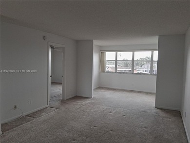 CHARMING 2 bed/ 2 bath, 3RD FLOOR LAKE FRONT CONDO located in on Sunrise Lakes Phase IV Golf Course in Florida - for sale on GolfHomes.com, golf home, golf lot