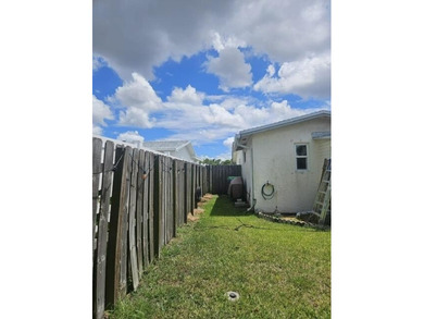 This Gorgeous home located in quiet Sunrise Golf Village. The on Sunrise Lakes Phase IV Golf Course in Florida - for sale on GolfHomes.com, golf home, golf lot