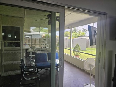 This Gorgeous home located in quiet Sunrise Golf Village. The on Sunrise Lakes Phase IV Golf Course in Florida - for sale on GolfHomes.com, golf home, golf lot