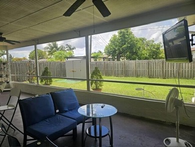 This Gorgeous home located in quiet Sunrise Golf Village. The on Sunrise Lakes Phase IV Golf Course in Florida - for sale on GolfHomes.com, golf home, golf lot