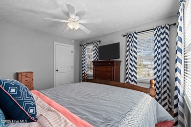 Beautiful custom-Bill Seldomridge built home showcasing serene on Beacon Ridge Golf and Country Club in North Carolina - for sale on GolfHomes.com, golf home, golf lot