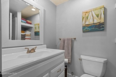 Beautiful custom-Bill Seldomridge built home showcasing serene on Beacon Ridge Golf and Country Club in North Carolina - for sale on GolfHomes.com, golf home, golf lot