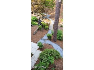 Beautiful custom-Bill Seldomridge built home showcasing serene on Beacon Ridge Golf and Country Club in North Carolina - for sale on GolfHomes.com, golf home, golf lot