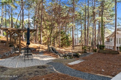 Beautiful custom-Bill Seldomridge built home showcasing serene on Beacon Ridge Golf and Country Club in North Carolina - for sale on GolfHomes.com, golf home, golf lot
