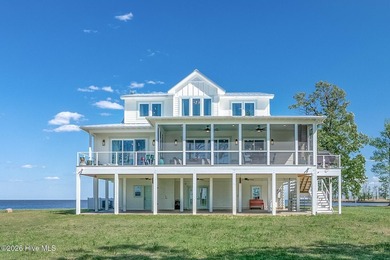 Set on a rare 1.98-acre peninsula at the convergence of the on Sound Golf Links at Albemarle Plantation in North Carolina - for sale on GolfHomes.com, golf home, golf lot