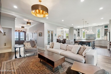 Set on a rare 1.98-acre peninsula at the convergence of the on Sound Golf Links at Albemarle Plantation in North Carolina - for sale on GolfHomes.com, golf home, golf lot