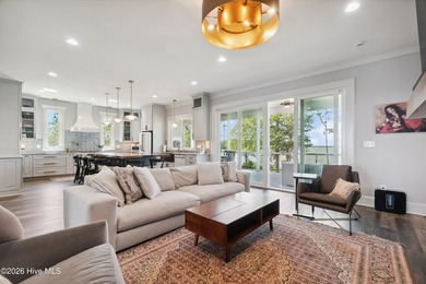 Set on a rare 1.98-acre peninsula at the convergence of the on Sound Golf Links at Albemarle Plantation in North Carolina - for sale on GolfHomes.com, golf home, golf lot