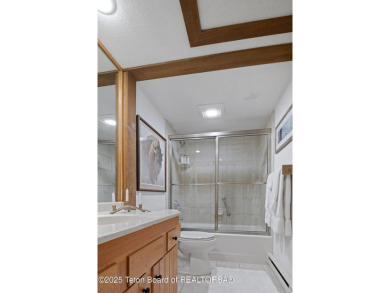 This beautifully updated two-bedroom, two-bath townhome with a on Jackson Hole Golf and Tennis Club in Wyoming - for sale on GolfHomes.com, golf home, golf lot