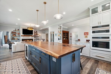 Set on a rare 1.98-acre peninsula at the convergence of the on Sound Golf Links at Albemarle Plantation in North Carolina - for sale on GolfHomes.com, golf home, golf lot