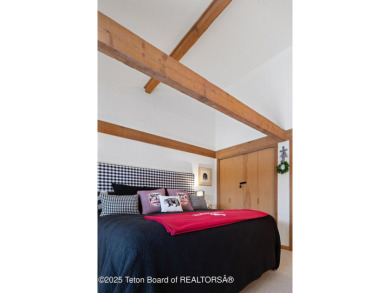This beautifully updated two-bedroom, two-bath townhome with a on Jackson Hole Golf and Tennis Club in Wyoming - for sale on GolfHomes.com, golf home, golf lot