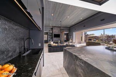 Live where the desert feels like a private resort. Perched on on Stone Canyon Club in Arizona - for sale on GolfHomes.com, golf home, golf lot