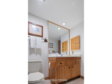 This beautifully updated two-bedroom, two-bath townhome with a on Jackson Hole Golf and Tennis Club in Wyoming - for sale on GolfHomes.com, golf home, golf lot