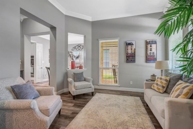 Nestled in a beautifully landscaped, gated community, this on Heritage Lakes - Par 3 - 9 Hole Course in Texas - for sale on GolfHomes.com, golf home, golf lot