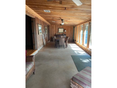 Enjoy the best of Lake Bruin living at this fully furnished on Lake Bruin Golf and Country Club in Louisiana - for sale on GolfHomes.com, golf home, golf lot