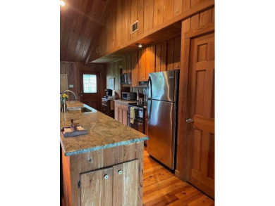 Enjoy the best of Lake Bruin living at this fully furnished on Lake Bruin Golf and Country Club in Louisiana - for sale on GolfHomes.com, golf home, golf lot