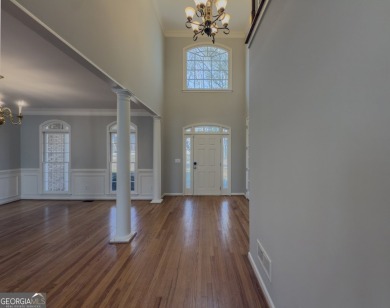 This stunning 4-bedroom, 3 full bath, and 2 half bath home on The Providence Club in Georgia - for sale on GolfHomes.com, golf home, golf lot