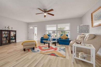 WATERFRONT LIVING IN STYLE... ENJOY YOUR NEW HOME IN THIS ACTIVE on Mainlands Golf Club in Florida - for sale on GolfHomes.com, golf home, golf lot