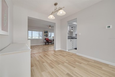 WATERFRONT LIVING IN STYLE... ENJOY YOUR NEW HOME IN THIS ACTIVE on Mainlands Golf Club in Florida - for sale on GolfHomes.com, golf home, golf lot