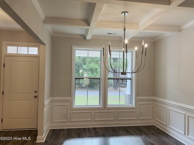 This stunning new 4-bedroom, 2.5-bath home in the gated Woodlake on Woodlake Country Club in North Carolina - for sale on GolfHomes.com, golf home, golf lot