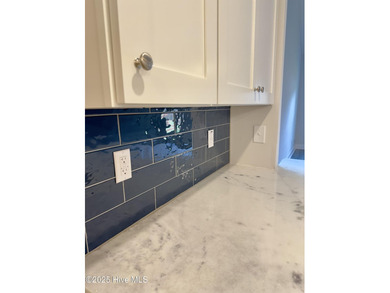 This stunning new 4-bedroom, 2.5-bath home in the gated Woodlake on Woodlake Country Club in North Carolina - for sale on GolfHomes.com, golf home, golf lot