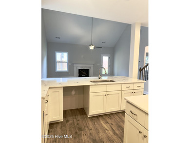 This stunning new 4-bedroom, 2.5-bath home in the gated Woodlake on Woodlake Country Club in North Carolina - for sale on GolfHomes.com, golf home, golf lot