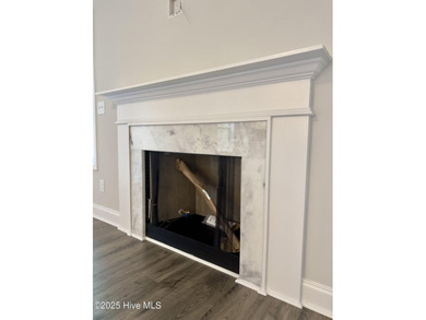 This stunning new 4-bedroom, 2.5-bath home in the gated Woodlake on Woodlake Country Club in North Carolina - for sale on GolfHomes.com, golf home, golf lot