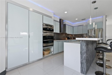 Stunning corner-lot home built in 2012, featuring modern design on Fontainebleau Golf Course in Florida - for sale on GolfHomes.com, golf home, golf lot
