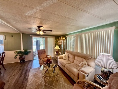 Home is located in Water Oak Country Club Estates, an active 55 on Water Oak Country Club Estates in Florida - for sale on GolfHomes.com, golf home, golf lot