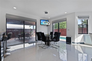 Stunning corner-lot home built in 2012, featuring modern design on Fontainebleau Golf Course in Florida - for sale on GolfHomes.com, golf home, golf lot