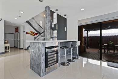 Stunning corner-lot home built in 2012, featuring modern design on Fontainebleau Golf Course in Florida - for sale on GolfHomes.com, golf home, golf lot
