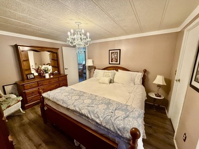 Home is located in Water Oak Country Club Estates, an active 55 on Water Oak Country Club Estates in Florida - for sale on GolfHomes.com, golf home, golf lot