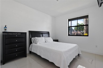 Stunning corner-lot home built in 2012, featuring modern design on Fontainebleau Golf Course in Florida - for sale on GolfHomes.com, golf home, golf lot