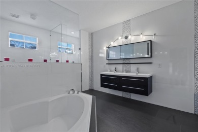 Stunning corner-lot home built in 2012, featuring modern design on Fontainebleau Golf Course in Florida - for sale on GolfHomes.com, golf home, golf lot
