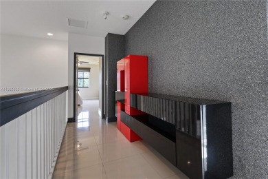Stunning corner-lot home built in 2012, featuring modern design on Fontainebleau Golf Course in Florida - for sale on GolfHomes.com, golf home, golf lot