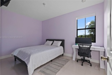 Stunning corner-lot home built in 2012, featuring modern design on Fontainebleau Golf Course in Florida - for sale on GolfHomes.com, golf home, golf lot