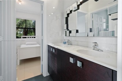 Stunning corner-lot home built in 2012, featuring modern design on Fontainebleau Golf Course in Florida - for sale on GolfHomes.com, golf home, golf lot